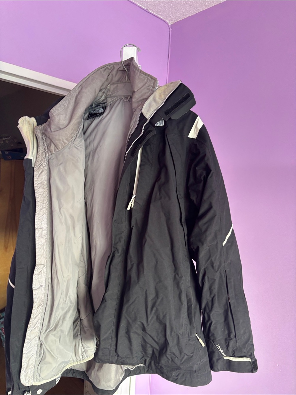 North face men’s black jacket.  Zip out liner.